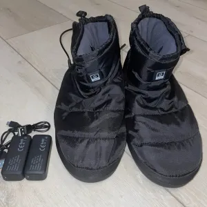 Heated Indoor/Outdoor Slippers by Sharper Image